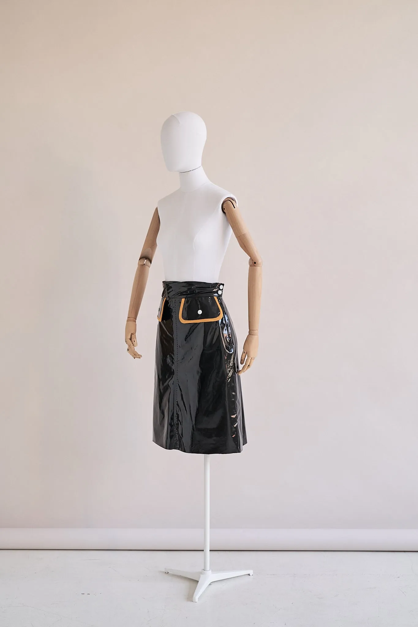 66-3 Slightly flared skirt with decorative flaps