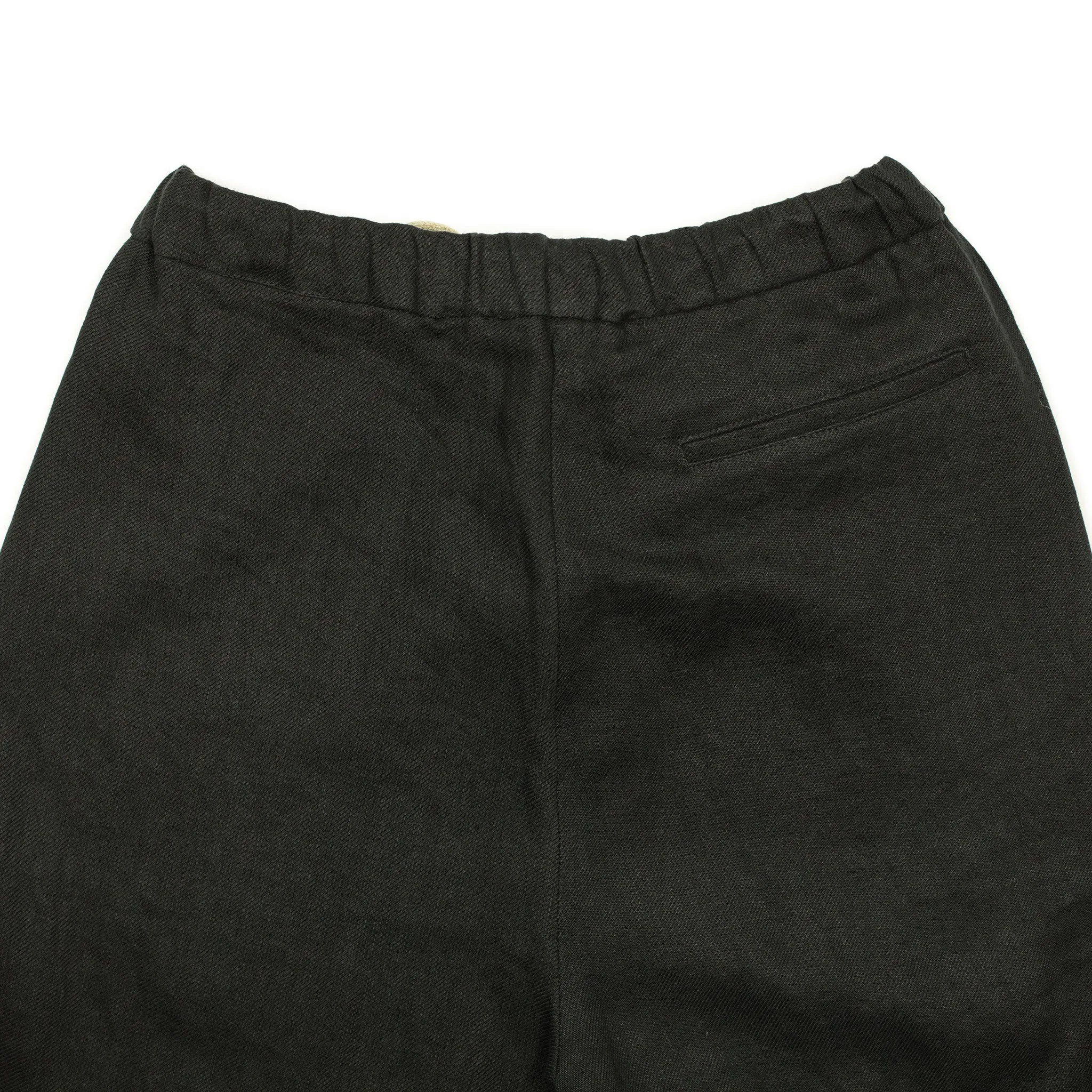 Pleated drawstring trousers in soft black washed linen twill
