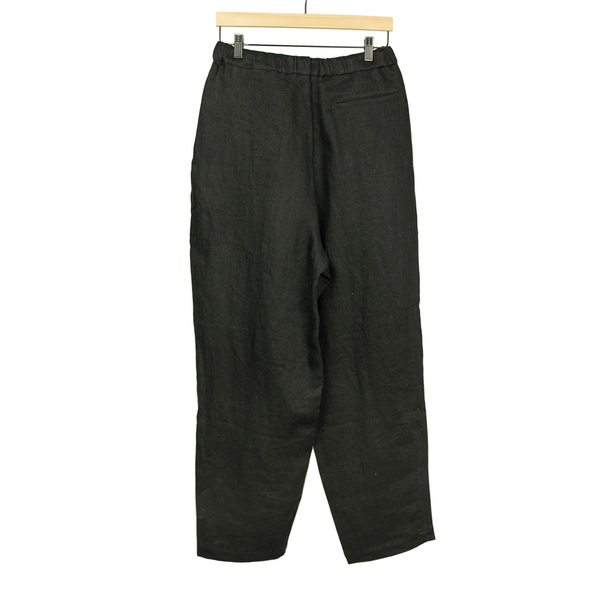 Pleated drawstring trousers in soft black washed linen twill