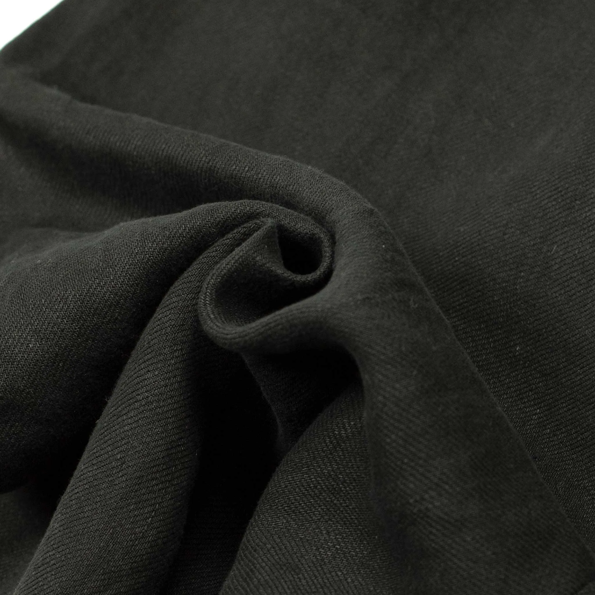 Pleated drawstring trousers in soft black washed linen twill