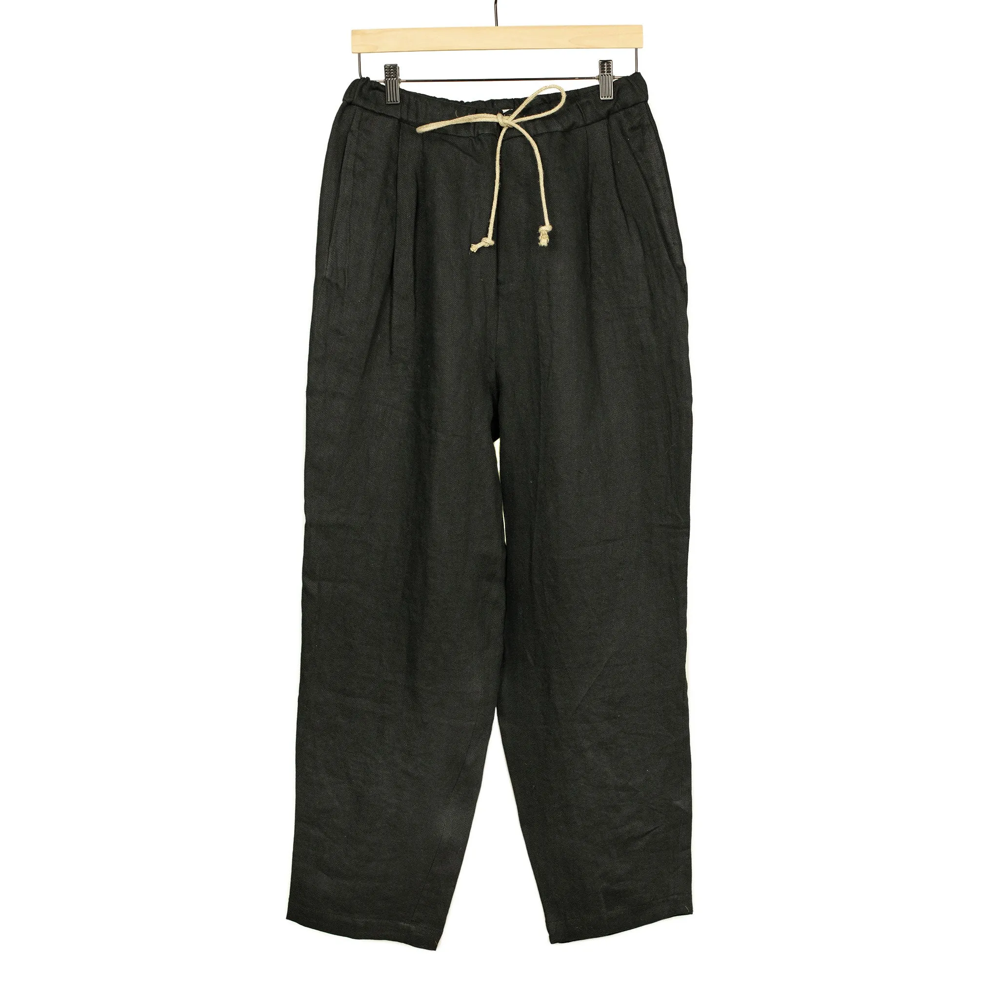 Pleated drawstring trousers in soft black washed linen twill